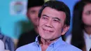 "Dengan berzikir pada Allah, maka tenanglah hati, kalau hati tenang, enggak stres, enggak ada pikiran. Jadi insya Allah dengan banyak ibadah, kita jadi merasa lebih tenang," ujar Rhoma Irama, Kamis (26/4/2018).  (Adrian Putra/Bintang.com)