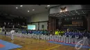 Para peserta berbaris rapi saat mengikuti pembukaan Kejuaraan Nasional (Kejurnas) Karate Panglima TNI III di GOR Ahmad Yani Mabes TNI Cilangkap, Jakarta, Kamis (15/1/2015). (Liputan6.com/Herman Zakharia)