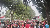 Suasana kirab Timnas Indonesia U-22 di Jakarta, Jumat (19/5/2023). (Bola.com/Hery Kurniawan)