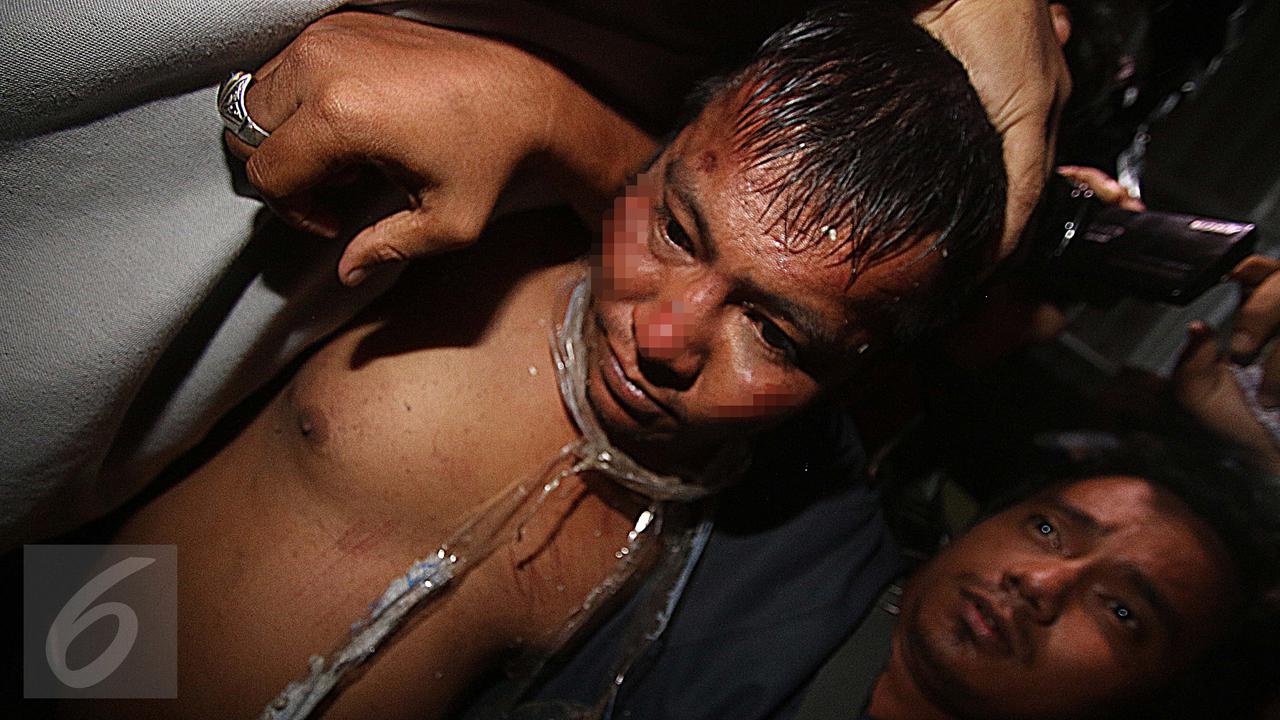 Tersangka Pembunuhan Sadis Pulomas Tiba di Polda Metro Jaya