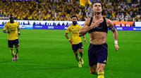 Cristano Ronaldo merayakan golnya ke gawang Al Fateh dalam laga Liga Pro Saudi di Al-Awwal Park, Minggu dini hari WIB (19-10-2025). (Dok. X @AlNassrFC_EN)