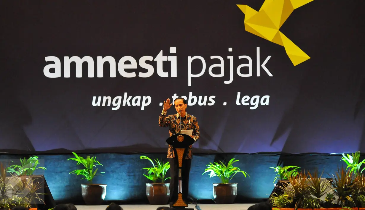 Presiden Joko Widodo (Jokowi) memberikan sambutan saat farewell atau perpisahan dengan program pengampunan pajak atau tax amnesty di Jakarta, Selasa (28/2). Penerimaan tax amnesty hingga hari ini telah mencapai Rp 112 triliun.(Liputan6.com/Angga Yuniar) 