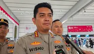 Polres Bandara Soetta Bagikan Masker dan Cek Kesehatan Calon Penumpang