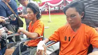 Nang dan Hendrik terbukti membunuh ME, calon pendeta cantik di Kabupaten OKI Sumsel (Liputan6.com / Nefri Inge)