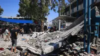 Selain kerusakan pada bangunan, serangan Israel di sekolah tersebut menewaskan sejumlah orang. (Eyad BABA/AFP)