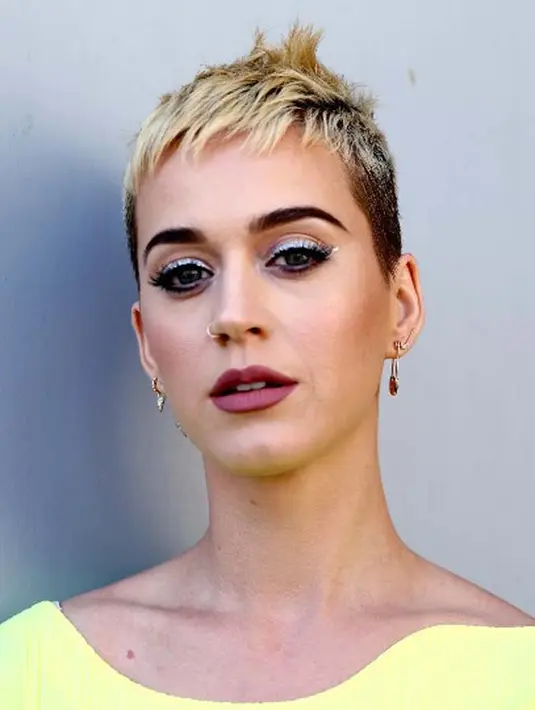 “Tolong dengar, aku sangat ingin masalah ini selesai. Aku pun ingin mengakhiri perang yang ada. Aku juga sedih, dan dia belum juga hubungiku,” ujar Katy. (AFP/Rich Furry)