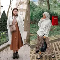 Siasati tubuh berisi dengan padu padan rok panjang ala publik figur berikut ini.