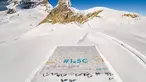 Kartu pos raksasa terbuat lebih dari 125.000 kartu pos yang dikumpulkan untuk memecahkan Rekor Dunia Guinness di Jungfraufirn, Swiss, 16 November 2018. Kartu pos tersebut berisi pesan-pesan menentang perubahan iklim. (Valentin Flauraud/Keystone via AP)