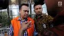 Ekspresi Direktur PT Murakabi Irvanto Hendra Pambudi usai menandatangani berkas P21 di gedung KPK, Jakarta, Jumat (6/7). Irvanto ditangkap terkait kasus dugaan korupsi proyek KTP Elektronik. (Merdeka.com/Dwi Narwoko)