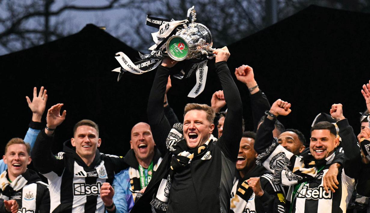 Newcastle United berhasil menjuarai Piala Liga Inggris setelah mengalahkan Liverpool dengan skor tipis 2-1 di Stadion Wembley pada beberapa waktu lalu. (AFP/Oli Scarff)