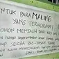 Tulisan Dilarang Maling (Sumber:1cak)