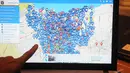 Sebuah layar saat sedang menampilkan foto dan lokasi pengaduan warga di aplikasi smartcity.jakarta.go.id, Jakarta, Senin (15/12/2014). (Liputan6.com/Herman Zakharia)