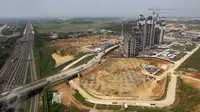 Suasana pembangunan kota baru berskala internasional di Kota Meikarta, Lippo Cikarang, Sabtu (13/05). Pembangunan kota seluas 22 juta meter persegi diklaim sebagai investasi hunian terbesar di Asia Tenggara. (Liputan6.com/Fery Pradolo)