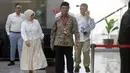 Penasihat Khusus Presiden Bidang Haji, Muhadjir Effendy (tengah), saat menunggu waktu pemeriksaan di Gedung Merah Putih Komisi Pemberantasan Korupsi (KPK), Jakarta, Senin (18/5/2026). (Liputan6.com/Helmi Fithriansyah)