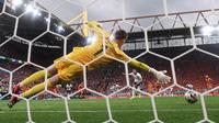 Striker Inggris, Harry Kane sukses menjebol gawang Belanda via penalti dalam laga semifinal Euro 2024, Kamis (11/7/2024) dini hari WIB. (KENZO TRIBOUILLARD / AFP)