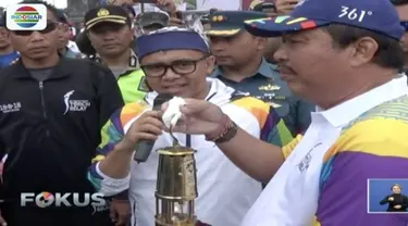 Suasana di Krobokan, Kabupaten Badung, Bali, mulai ramai oleh peserta yang siap menyambut kedatangan obor api Asian Games 2018.