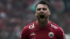 Striker Persija Jakarta, Marko Simic, merayakan gol yang dicetaknya ke gawang Barito Putera pada laga Liga 1 di Stadion Patriot, Jawa Barat, Selasa (30/10). Persija menang 3-0 atas Barito. (Bola.com/Vitalis Yogi Trisna)