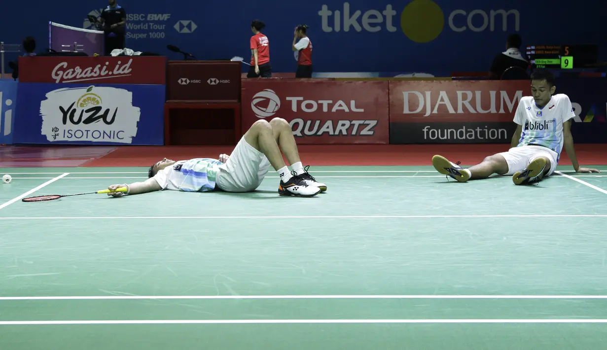Ganda putra Indonesia, Fajar Alfian/Muhammad Rian Ardianto, saat melawan ganda China, Huang Kai Xiang/Liu Cheng, pada Blibli Indonesia Open 2019 di Istora Senayan, Jakarta, Rabu (17/7). Fajar/Rian menang 18-21, 21-14, 21-16. (Bola.com/Yoppy Renato)