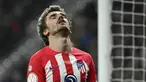 Reaksi penyerang Atletico Madrid Antoine Griezmann saat melawan Sevilla pada pertandingan sepak bola perempat final Copa del Rey (Piala Raja) Spanyol di Stadion Metropolitano, Madrid, Sapanyol, Kamis (25/1/2024). (JAVIER SORIANO/AFP)