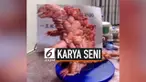 Seorang pria China membuat karya seni menarik dari cangkang hewan. Karya seninya berupa patung karakter monster.
