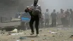Ledakan yang diduga bom mobil terjadi di pusat kota Douma, dekat Damaskus, Suriah, Sabtu (19/07/14) (REUTERS/Yousef Albostany).