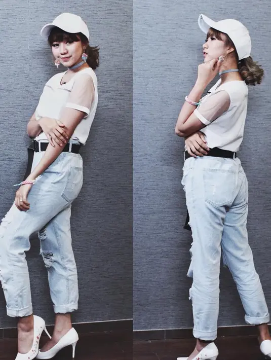 Tuh, Koreans style banget kan? Kali ini, Ghea memakai ripped jeans yang dipadukan dengan kaus putih dan topinya yang berwarna senada. Makin kece dan kekinian, Ghea mengenakan kalung dan anting kekiniannya.  (Instagram/gheaindrawari)