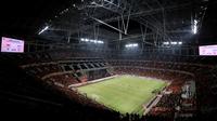 Suasana pertandingan dari atas tribun penonton saat laga persahabatan antara Persija Jakarta menghadapi Chonburi FC dalam rangka Grand Launching Jakarta International Stadium (JIS), Minggu (24/7/2022). (Bola.com/M Iqbal Ichsan)