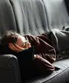 Ilustrasi sedang merasa malas, mager, rebahan. (Photo by Adrian Swancar on Unsplash)