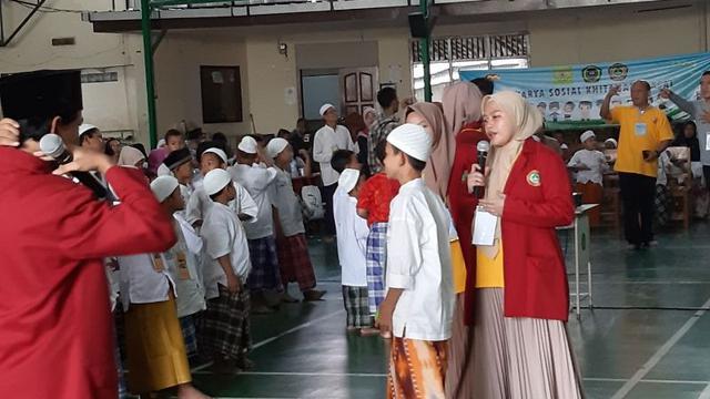 Hari Ibu, Komunitas Generasi Milenial dan Pondok Pesantren Minhaajurrosyidiin Gelar Karya Sosial