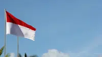 Ilustrasi bendera Indonesia, nasionalisme. (Photo by Nick Agus Arya on Unsplash)