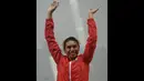 Atlet Lompat Jauh Indonesia, Maria Natalia Londa, berhasil meraih emas cabang lompat jauh putri Asian Games 2014. Ekspresi luapan kebahagiaan Maria di Incheon Asiad Main Staidium, Incheon, Senin (29/9). (AFP PHOTO/Manan Vatsyayana)
