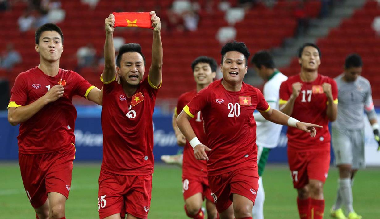 Ekspresi pemain Vietnam U-23, Huy Toan Vo, setelah mencetak gol ke gawang Indonesia U-23. (Bola.com/Arief Bagus)