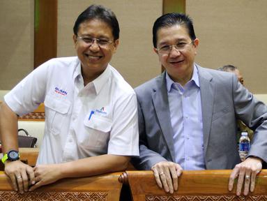 Dirut PT Indonesia Asahan Alumunium (Inalum) Budi Gunadi Sadikin (kiri) dan Dirut Freeport Tony Wenas saat rapat kerja dengan Komisi VII DPR di Gedung Nusantara I, Jakarta (15/1). Rapat membahas sejumlah agenda. (Liputan6.com/JohanTallo)