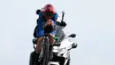 Sementara itu, pembalap Jumbo Visma, Jonas Vingegaard yang memiliki misi untuk merebut jersey pink harus puas finis di peringkat ke-13 dengan catatan waktu 48 menit 53 detik. (AFP/Luca Bettini)