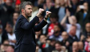 Pelatih sementara Manchester United asal Inggris, Michael Carrick, bereaksi setelah pertandingan Liga Inggris antara Manchester United dan Liverpool di Old Trafford, Manchester, barat laut Inggris, pada 3 Mei 2026. (Darren Staples/AFP)