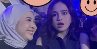 Bersama Syifa Hadju, Kesha tampil mengenakan blazer hitam dengan inner warna senada dipadukan kerudung putih dan anting mutiara sebagai ciri khasnya. [@kesharatuliu05]