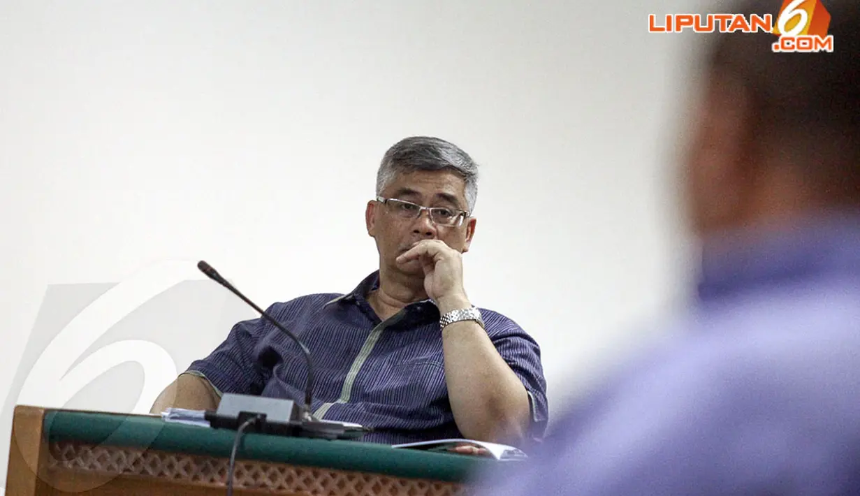 Mantan Ketua MK, Akil Mochtar kembali menjalani persidangan lanjutan di Pengadilan Tindak Pidana Korupsi, Jakarta, Senin (21/4/2014). (Liputan6.com/Faizal Fanani)
