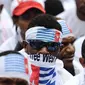Aksi demo warga Papua berikat kepala lambang bintang kejora di Bundaran HI, Jakarta, Senin (1/12/2014). (Liputan6.com/Faizal Fanani) 