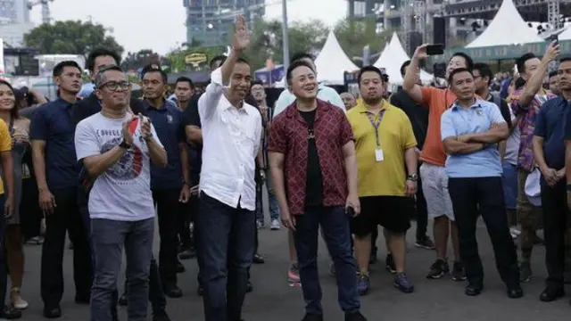 Jokowi nonton WTF 2018 (Hak Cipta: KapanLagi.com®/Agus Apriyanto/ssm)