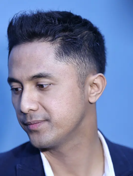 "Kemarin habis naik gunung Krakatau, 4 hari di sana, ninggalin keluarga sekarang baru ketemu keluarga lagi," kata Hengky Kurniawan usai Rumpi No Secret, kawasan Tendean, Jakarta Selatan, Senin (31/7). (Adrian Putra/Bintang.com)