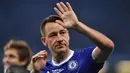 John Terry. Bek tengah yang menjadi legenda di Chelsea ini total bermain dalam 19 musim, mulai 1998/1999 hingga 2016/2017 dengan total tampil sebanyak 717 laga dengan torehan 67 gol. Ia pensiun pada 2018 bersama Aston Villa yang tengah berlaga di Championship. (Foto: AFP/Ben Stansall)