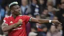 Gelandang Manchester United, Paul Pogba, melakukan selebrasi usai mencetak gol ke gawang Manchester City pada laga Premier League di Stadion Etihad, Sabtu (7/4/2018). Manchester City takluk 2-3 dari Manchester United. (AP Photo/Matt Dunham)