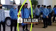 Viral foto pegawai PNS pria memakai baju Korpri mirip gamis. Menurut peraturan Permendagri nomor 11 tahun 2020 tentang pakaian dinas ASN model baju pegawai ini tidak sesuai aturan.
