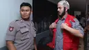 Tak bisa berbuat banyak atas tuntutan jaksa, Rio Reifan hanya bisa pasrah. (Galih W. Satria/Bintang.com)