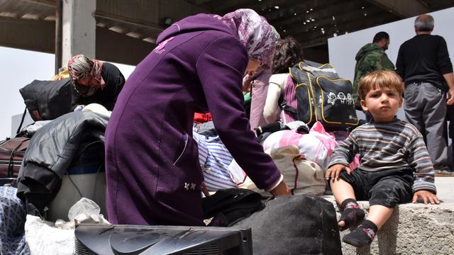 Wajah Polos Bocah Suriah Saat Ikut Evakuasi-AFP-20170421