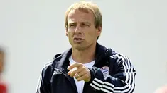 FC Bayern Munich's new coach Juergen Klinsmann gestures during his first day of training at the club on June 30, 2008 in the southern German city of Munich. AFP PHOTO DDP / OLIVER LANG