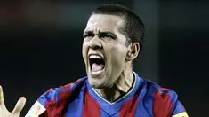 Kegembiraan bek Barcelona, Daniel Alves seusai gol Lionel Messi ke gawang Malaga dalam lanjutan La Liga di Camp Nou Stadium, 27 Februari 2010 AFP PHOTO / JOSEP LAGO 