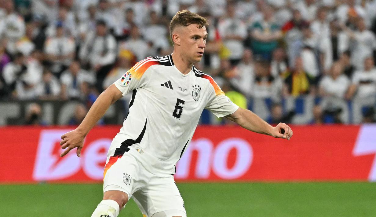 Joshua Kimmich telah memperkuat Timnas Jerman sejak tahun 2015. Sebagai pemain reguler di Bayern dan Der Panzer, Kimmich memiliki harga pasar yang cukup lumayan. Nilainya mencapai angka 50 juta euro. (AFP/Miguel Medina)