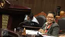Siti Nurlaila, Wakil Ketua Komnas HAM saat menghadiri sidang uji materi UU No 26 Tahun 2000 tentang Pengadilan HAM di Gedung Mahkamah Konstitusi, Jakarta, Selasa (8/9). Permohonan uji materi ini diajukan keluarga korban 1998. (Liputan6.com/Helmi Afandi)