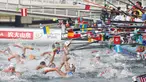 Perenang meraih botol minuman saat berlaga dalam lomba renang air terbuka nomor 10 km putra di Kejuaraan Renang Dunia di Yeosu, Korea Selatan, Selasa (16/7/2019). (HANDOUT/FINA ORGANISING COMMITTEE VIA YONHAP/AFP)